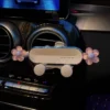 S974df00770ad4e2bb997a8f15969a8dfK Supporto Smartphone Auto Bocchetta Aria Clip Cartoon Porta Cellulare Navigatore